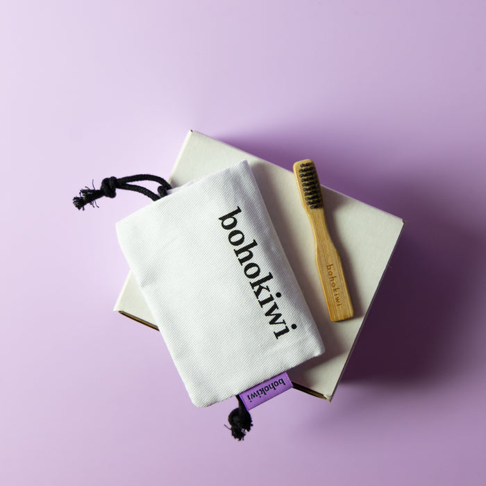 bohokiwi cotton storage bag with bamboo brush and period care accessories