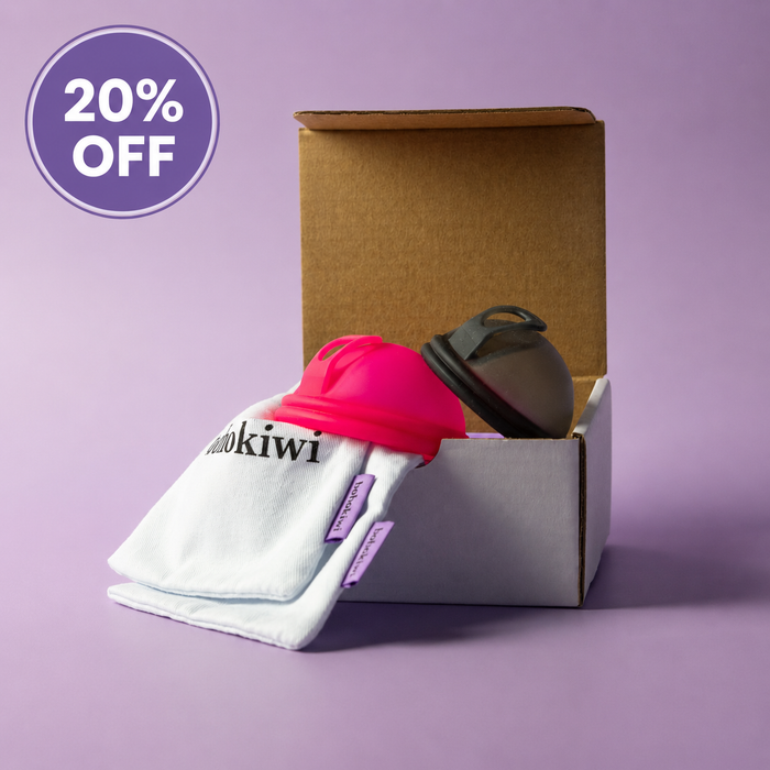 Bohokiwi reusable menstrual disc two pack with Neon Pink and Midnight Black discs and cotton storage bags, with 20% off promotion