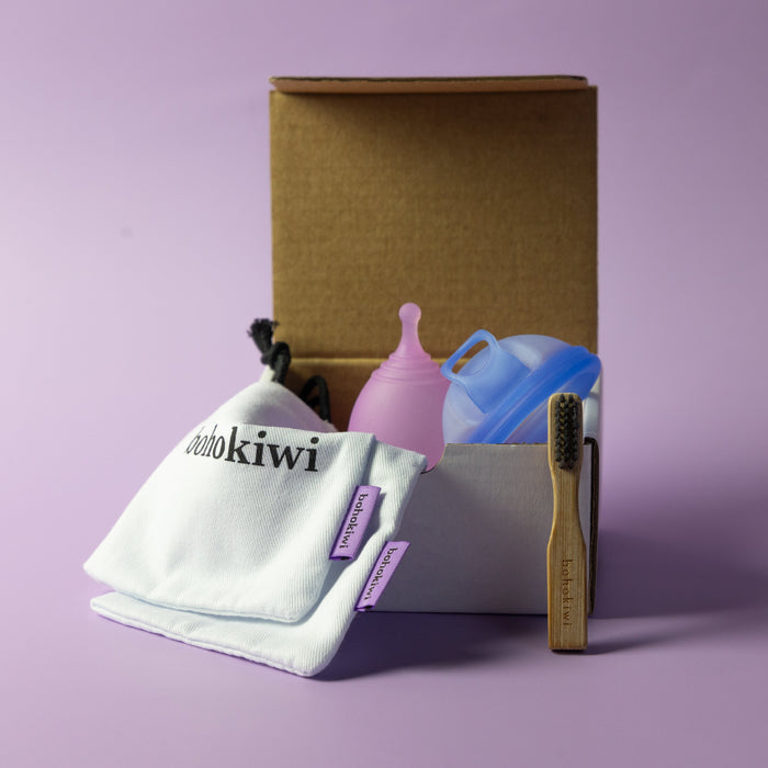 Bohokiwi Lavender menstrual cup and Ocean Blue menstrual disc set with cotton storage bags and bamboo cleaning brush