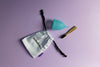 bohokiwi reusable silicone menstrual cup in sapphire blue with cotton storage bag and bamboo cleaning brush