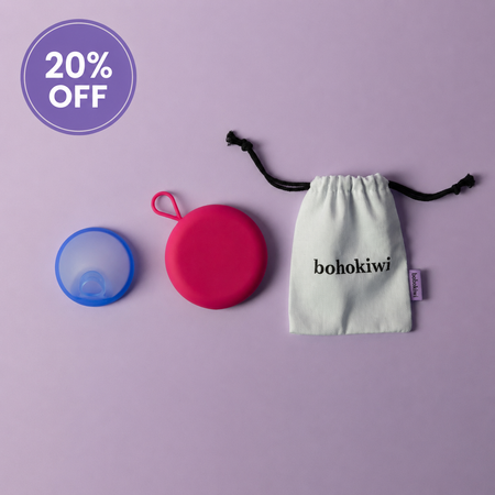 Bohokiwi Ocean Blue menstrual disc with Pink round carrier case and cotton storage bag, with 20% off promotion