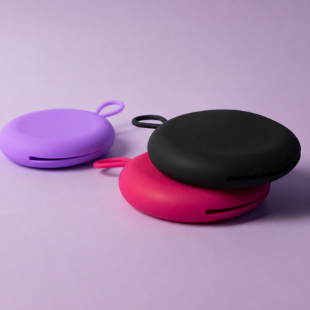 Bohokiwi round menstrual disc carrier cases in Purple, Pink and Black