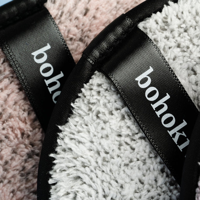 Close-up of bohokiwi reusable makeup remover pads with finger straps