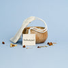 Reusable cotton tea bag filled with loose-leaf tea