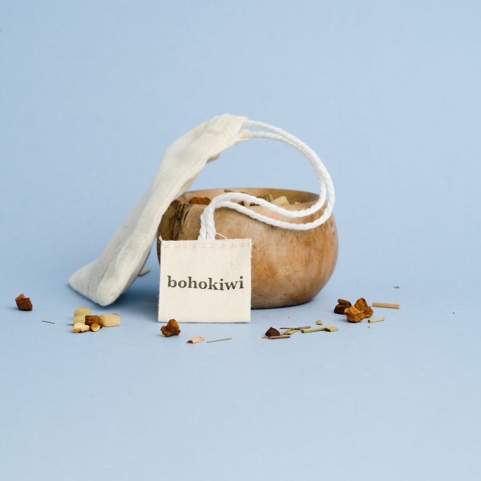 Reusable cotton tea bag filled with loose-leaf tea